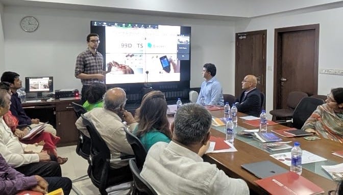 Jackson presenting at workshop in India